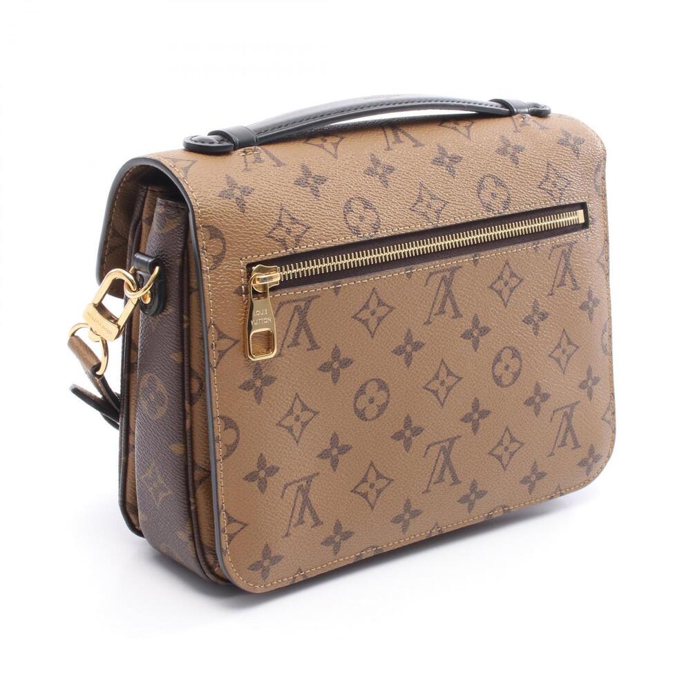 Louis Vuitton Brown Leather Handbag Canvas Monogram Metis Reverse Pochette